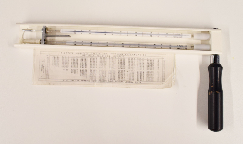 A whirling hygrometer and measurement chart.